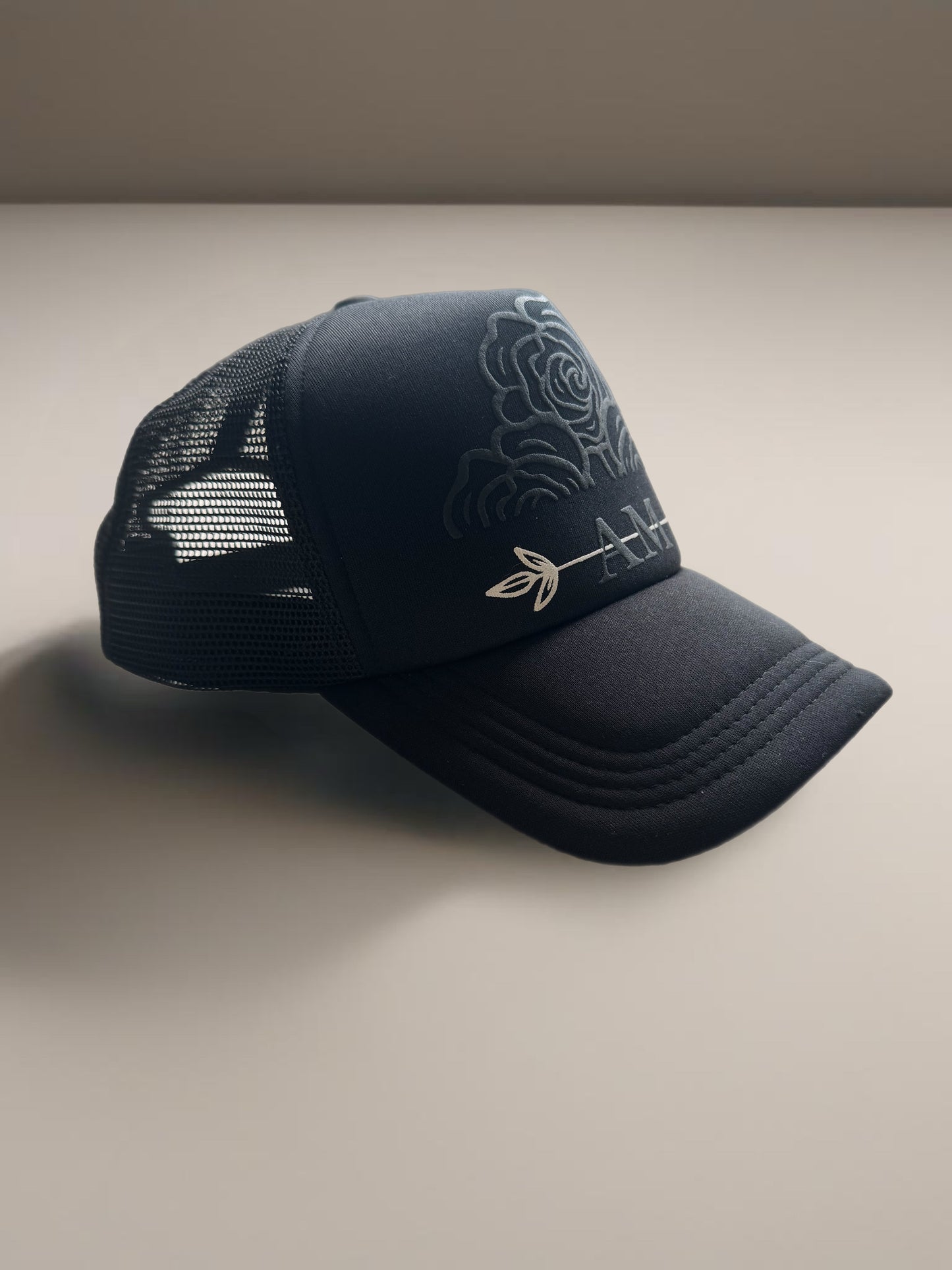 AM DIVIDED Trucker Hat Black